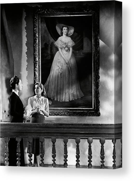 Joan Fontaine Canvas Print featuring the photograph JOAN FONTAINE and JUDITH ANDERSON in REBECCA -1940-. #1 by Album