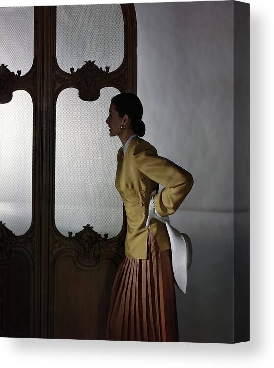 Fashion Canvas Print featuring the photograph Model In A Vogue Patterns Ensemble #1 by Horst P. Horst