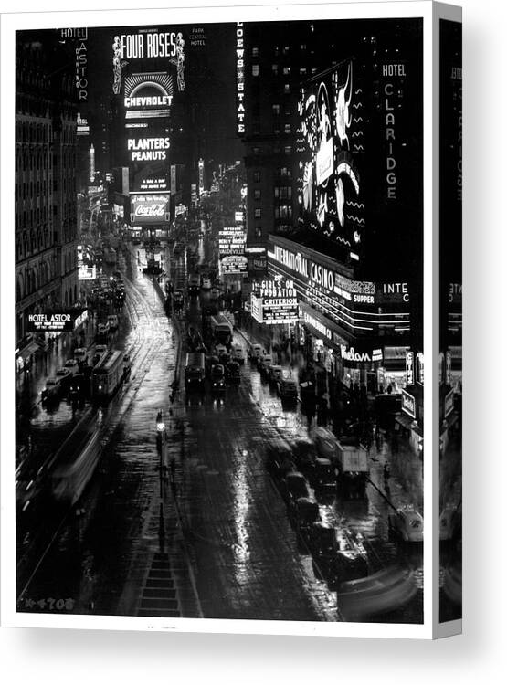 1930-1939 Canvas Print featuring the photograph Times Square At Night In New York City #1 by Camerique