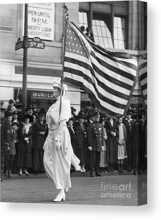 Marching Canvas Print featuring the photograph Woman Marching In Suffrage Parade #1 by Bettmann