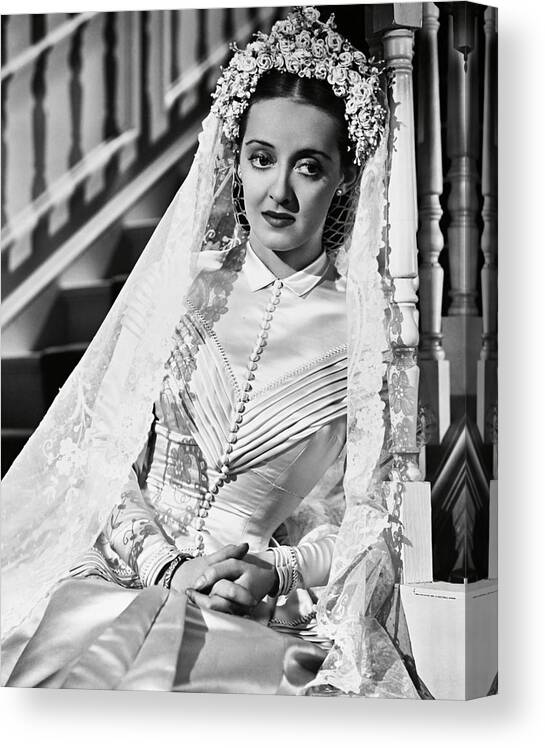 Bette Davis Canvas Print featuring the photograph BETTE DAVIS in THE OLD MAID -1939-. by Album