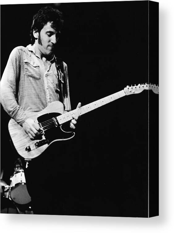 Rock Music Canvas Print featuring the photograph Bruce Springsteen Playing Guitar Live by American Stock