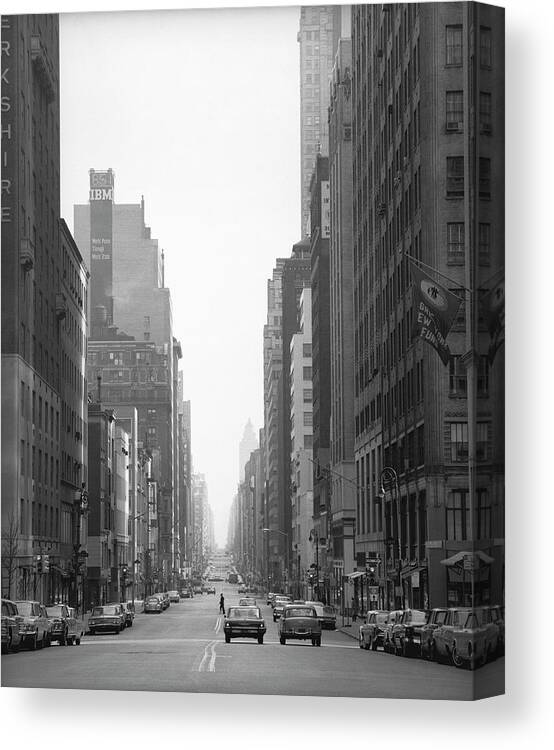 Long Canvas Print featuring the photograph Cars Riding On Street Of American City by George Marks