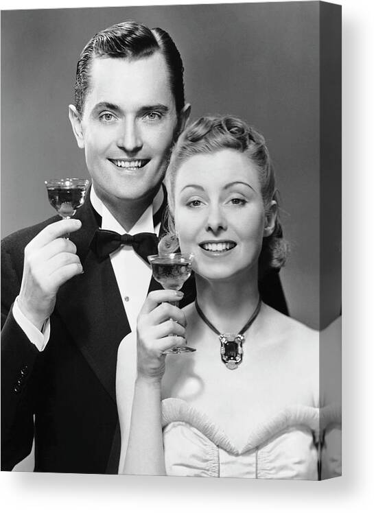 Heterosexual Couple Canvas Print featuring the photograph Couple W Champagne Glasses by George Marks