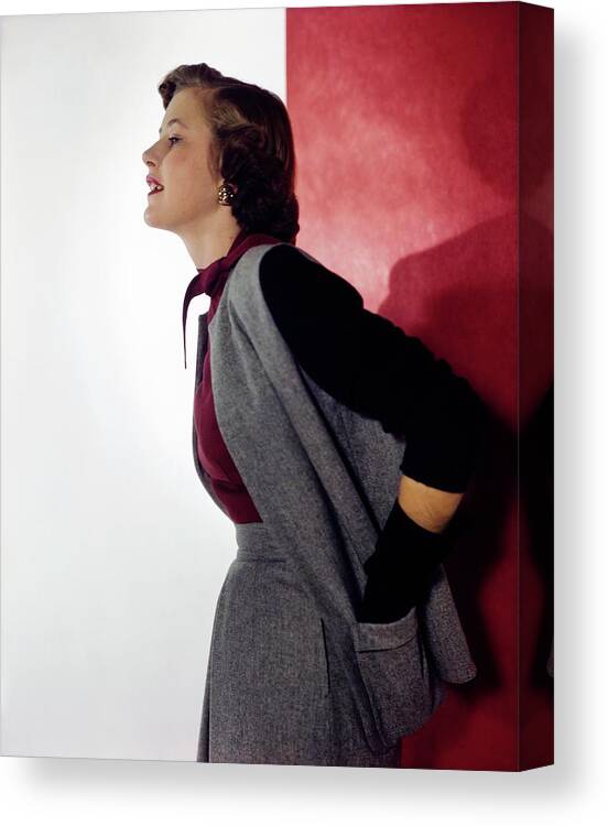 Fashion Canvas Print featuring the photograph Cynthia Mcdonald In Gray Flannel by Horst P. Horst