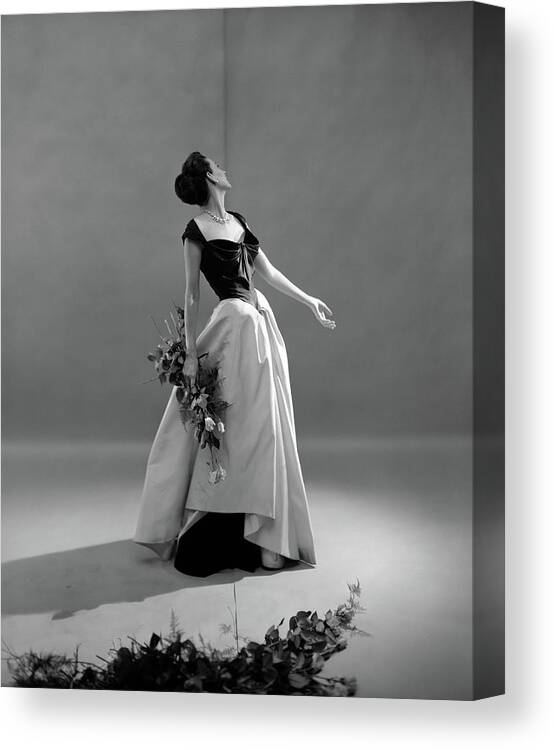 #new2022vogue Canvas Print featuring the photograph Dorian Leigh Wearing A Charles James Gown by Cecil Beaton
