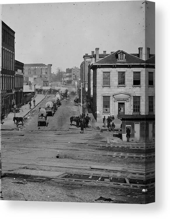Civil War Canvas Print featuring the painting Downtown Atlanta with Sherman's Wagon Train Moving Through by George Barnard