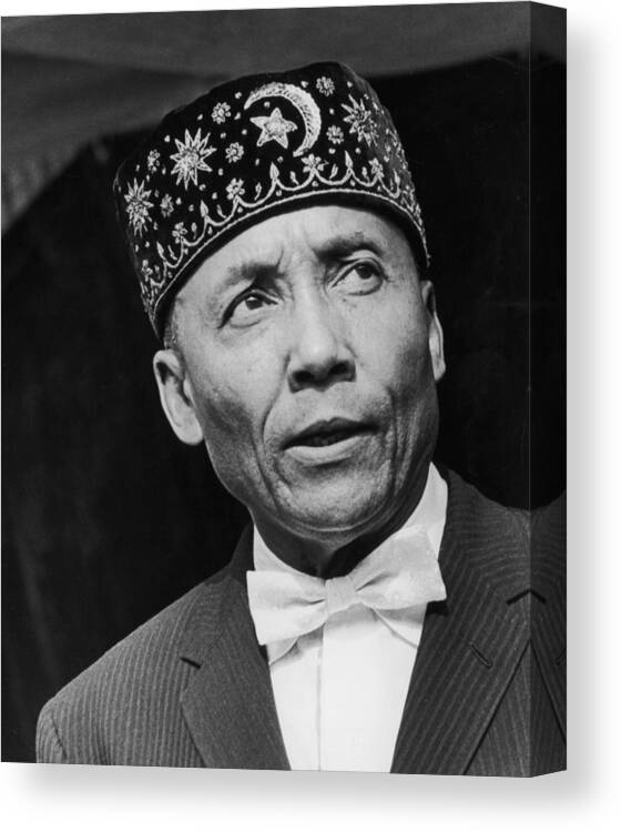 Elijah Muhammad - Religious Leader Canvas Print featuring the photograph Elijah Muhammad by Hulton Archive