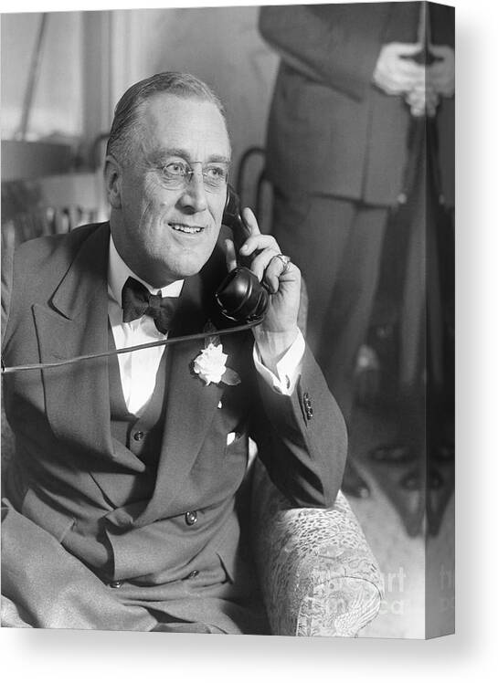 Mature Adult Canvas Print featuring the photograph Franklin Delano Roosevelt On Telephone by Bettmann