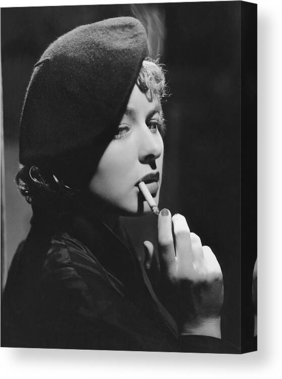 Ingrid Bergman Canvas Print featuring the photograph Ingrid Bergman Smoking by Globe Photos