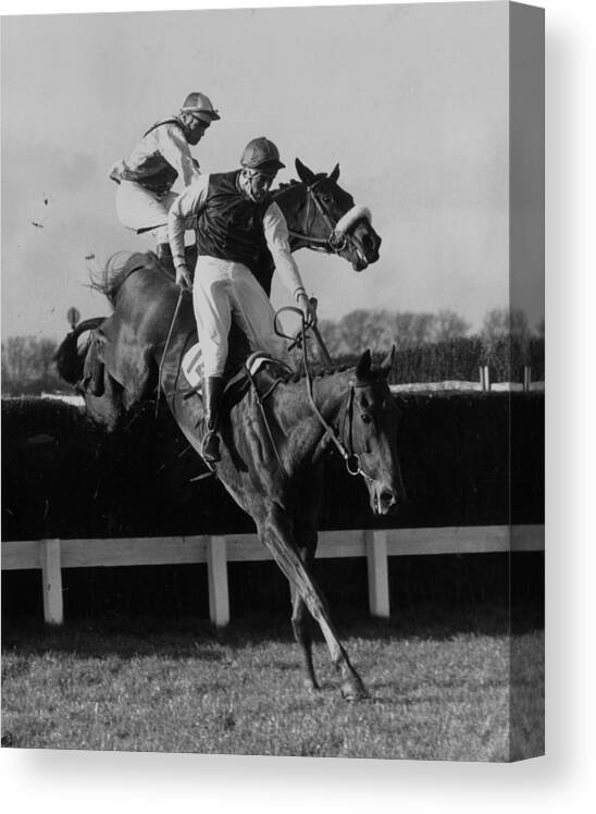 Horse Canvas Print featuring the photograph Jumping A Fence by George W. Hales