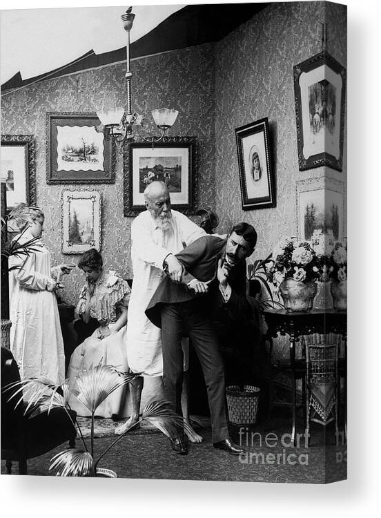 Stealing Canvas Print featuring the photograph Lovers Caught Stealing A Kiss by Bettmann