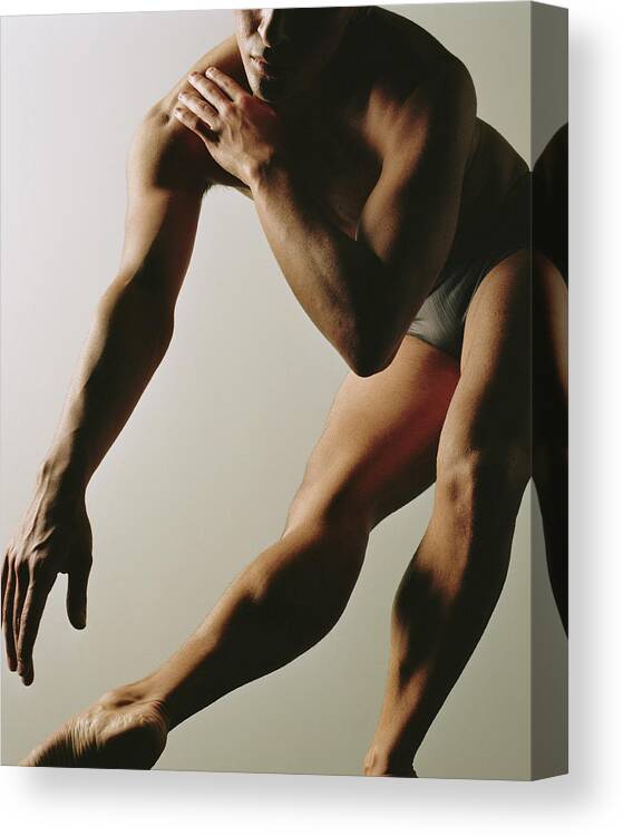 Ballet Dancer Canvas Print featuring the photograph Male Ballet Dancer Holding Pose by Ryan Mcvay
