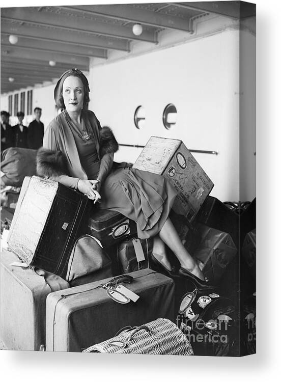 People Canvas Print featuring the photograph Marlene Dietrich On Boat, On Luggage by Bettmann