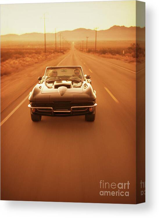 Heterosexual Couple Canvas Print featuring the photograph Mature Couple Driving In Convertible by Stephen Swintek