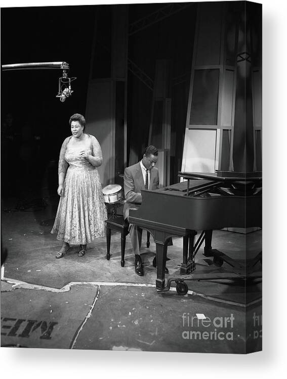 Singer Canvas Print featuring the photograph Nat King Cole Performs With Ella by Cbs Photo Archive