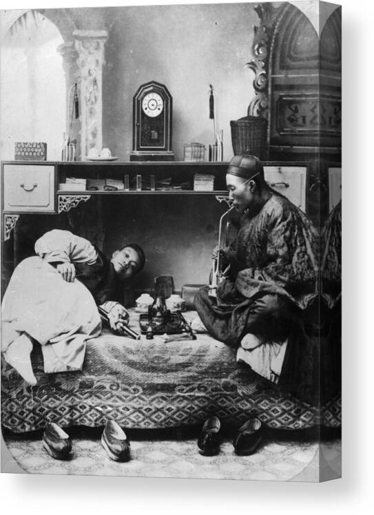 Smoking Canvas Print featuring the photograph Opium Smokers by Hulton Archive