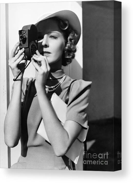 Poise Canvas Print featuring the photograph Portrait Of A Young Woman Taking by Everett Collection
