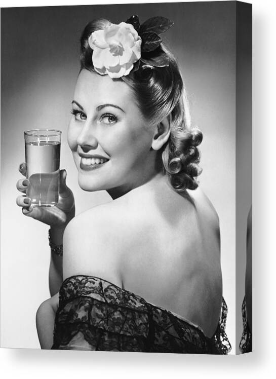 People Canvas Print featuring the photograph Portrait Of Woman Holding Glass Of Water by George Marks
