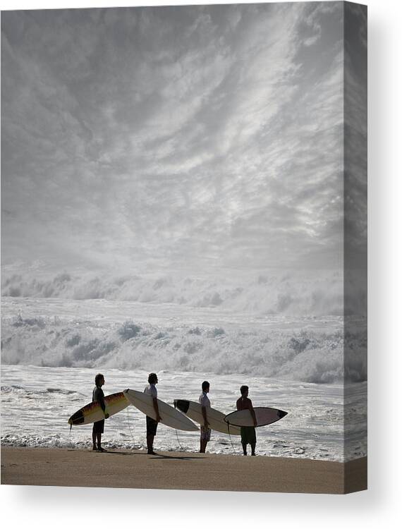 People Canvas Print featuring the photograph Surfers With Surfboard On Beach by Ed Freeman