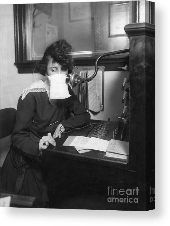 Protective Face Mask Canvas Print featuring the photograph Telephone Operator With Mask by Bettmann