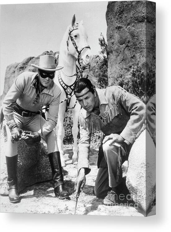 The Lone Ranger Canvas Print featuring the photograph The Lone Ranger And Tonto, Supervised by Bettmann