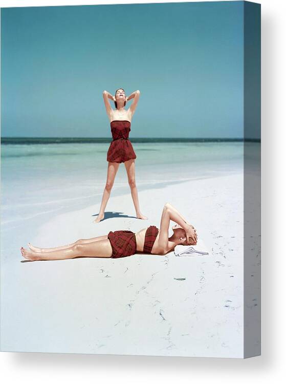 Fashion Canvas Print featuring the photograph Two Models in Wool Tartan Swimsuits, Vogue by John Rawlings