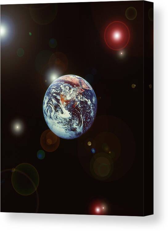 Globe Canvas Print featuring the photograph View Of Outer Space With Earth And by Grant Faint