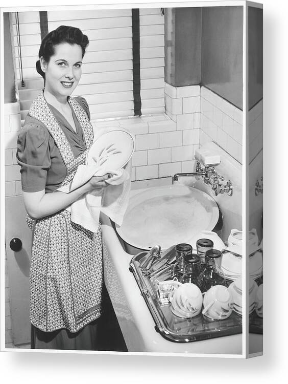 Three Quarter Length Canvas Print featuring the photograph Woman Drying Dishes At Kitchen Sink by George Marks