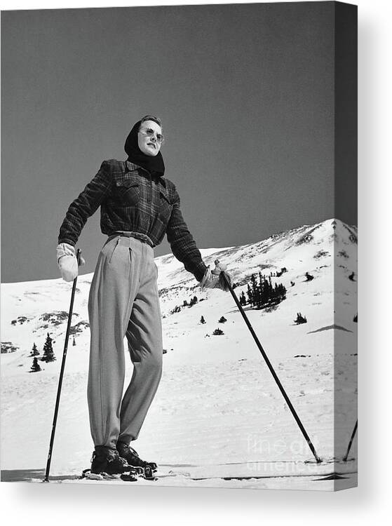 Ski Pole Canvas Print featuring the photograph Woman Skier Standing On Slopes by Stockbyte