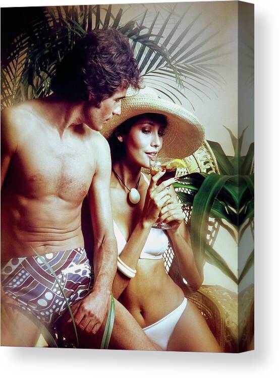 Swimwear Canvas Print featuring the photograph A Couple in Swimwear by Rocco Mancino