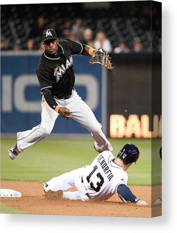 Double Play Canvas Print featuring the photograph Adeiny Hechavarria and Chris Denorfia by Denis Poroy