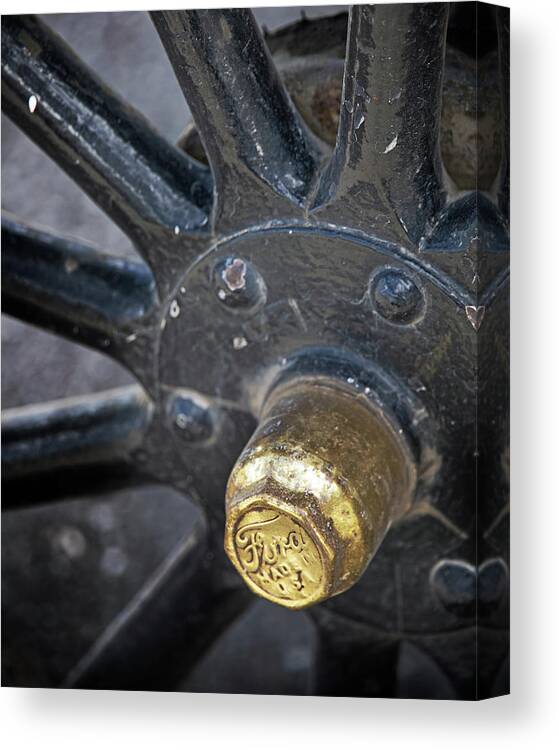 Ford Canvas Print featuring the photograph Antique Ford wheel by M Kathleen Warren