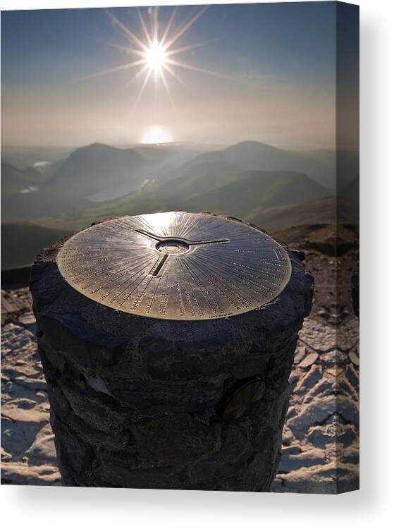 Snowdonia National Park Canvas Print featuring the photograph Circular plate on top of Snowdon Mountain summit trig point, Wales, UK by John Finney Photography