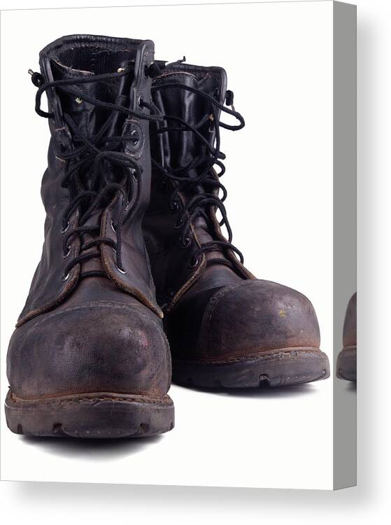 Toughness Canvas Print featuring the photograph Dirty Old Combat Boot by Lathuric