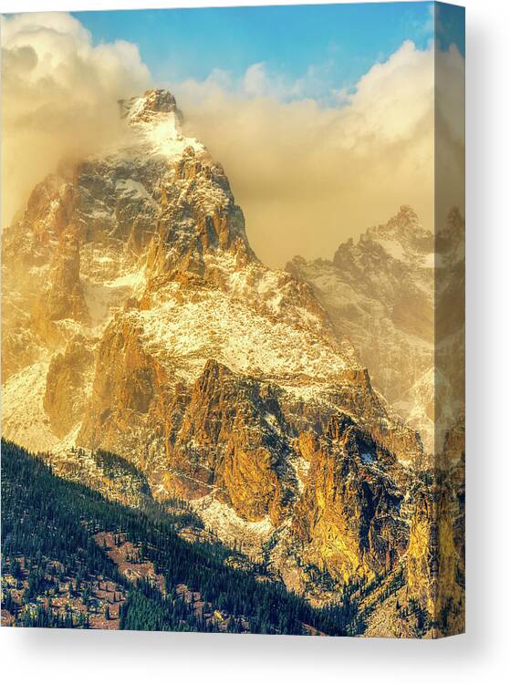Grand Canvas Print featuring the photograph Grand Tetons Draped in Clouds by Kenneth Everett