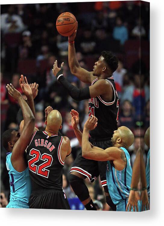 Chicago Bulls Canvas Print featuring the photograph Jimmy Butler, Michael Kidd-gilchrist, and Taj Gibson by Jonathan Daniel