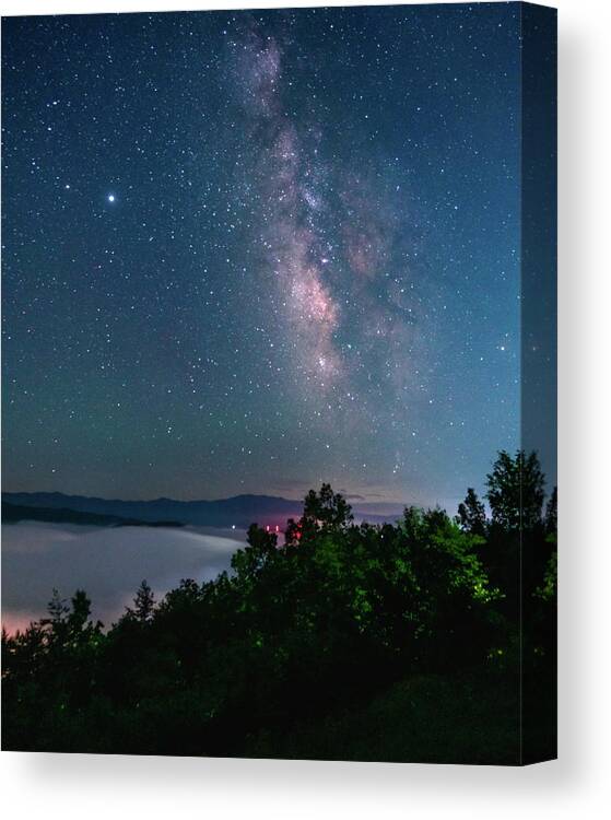 Milky Way Canvas Print featuring the photograph Milky Way over the clouds by Darrell DeRosia