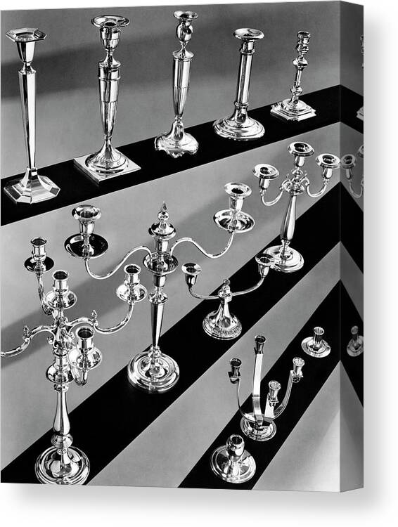 Still Life Canvas Print featuring the photograph Rows of Silver Candlesticks and Candelabras by Peter Nyholm