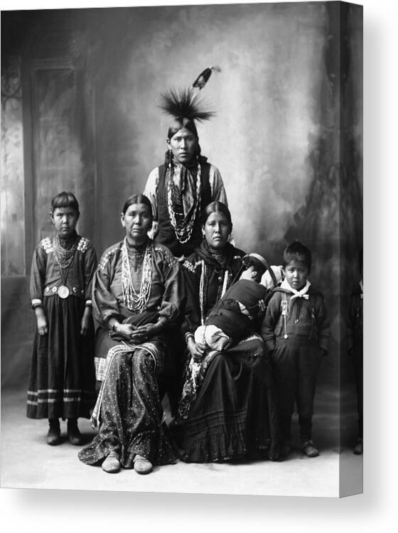 Sauk Tribe Canvas Print featuring the photograph Sauk Indian Family Portrait - Frank Rinehart - 1899 by War Is Hell Store