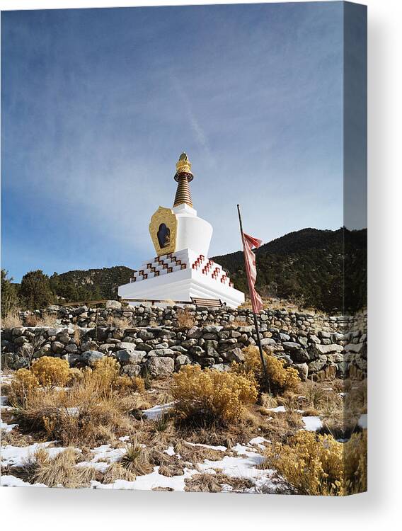 Wind Canvas Print featuring the photograph USA, Colorado, Crestone, Stuppa and prayer flag by Andrew Geiger