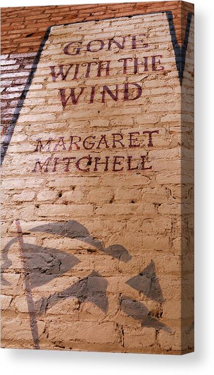 Urban Canvas Print featuring the photograph Gone With The Wind - Urban Book Store Sign by Steven Milner