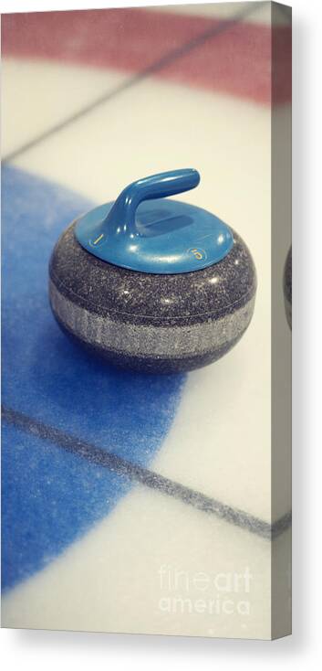 Curl Canvas Print featuring the photograph Blue Curling Stone by Priska Wettstein