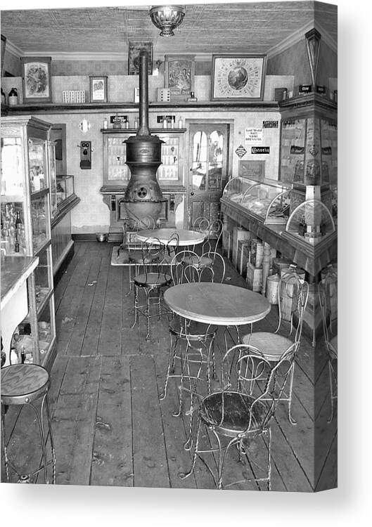 Vintage Drug Store Pictures Canvas Print featuring the photograph 1880 Drug Store Black and White by Ken Smith