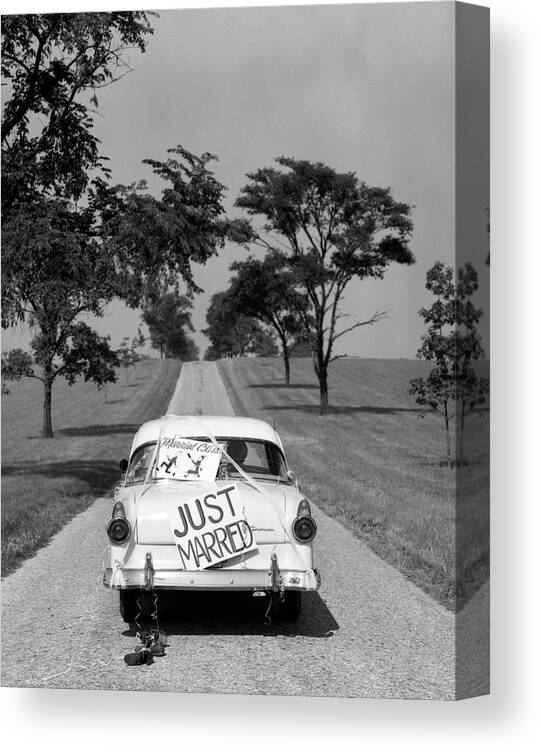 Photography Canvas Print featuring the photograph 1950s Back Of White Ford Sedan Driving by Vintage Images