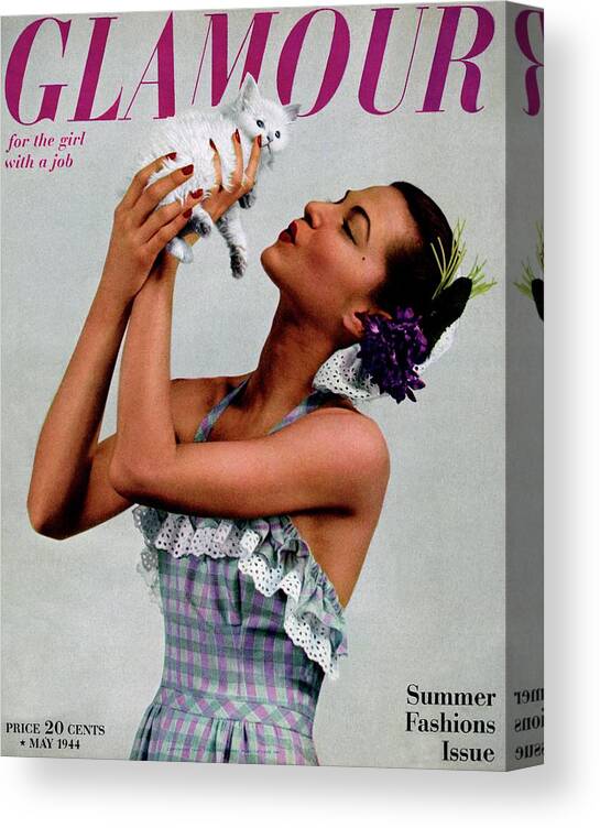 Fashion Canvas Print featuring the photograph A Model Holding A Kitten by Gjon Mili