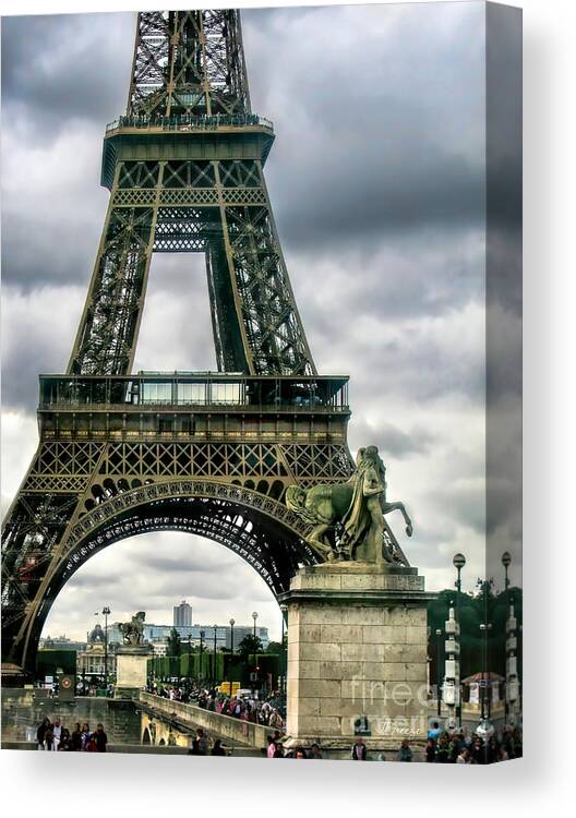 Paris Canvas Print featuring the photograph Beneath the Eiffel Tower by Jennie Breeze