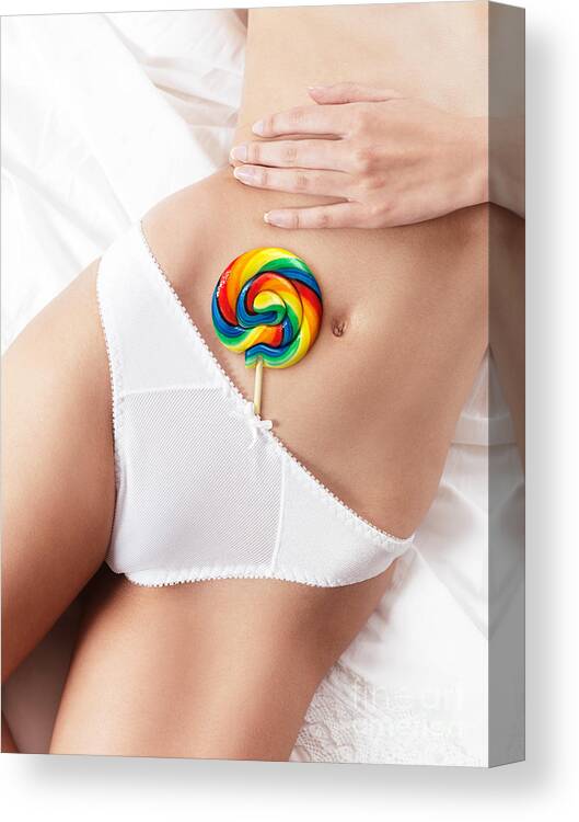 Closeup of sexy woman body with a lollipop in her underwear Canvas
