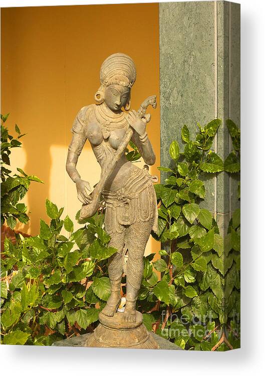 Torremolinos Canvas Print featuring the photograph Indian statue by Brenda Kean