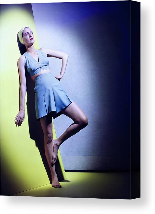 Fashion Canvas Print featuring the photograph Model Wearing A Sharkskin Bathing Suit by Horst P. Horst